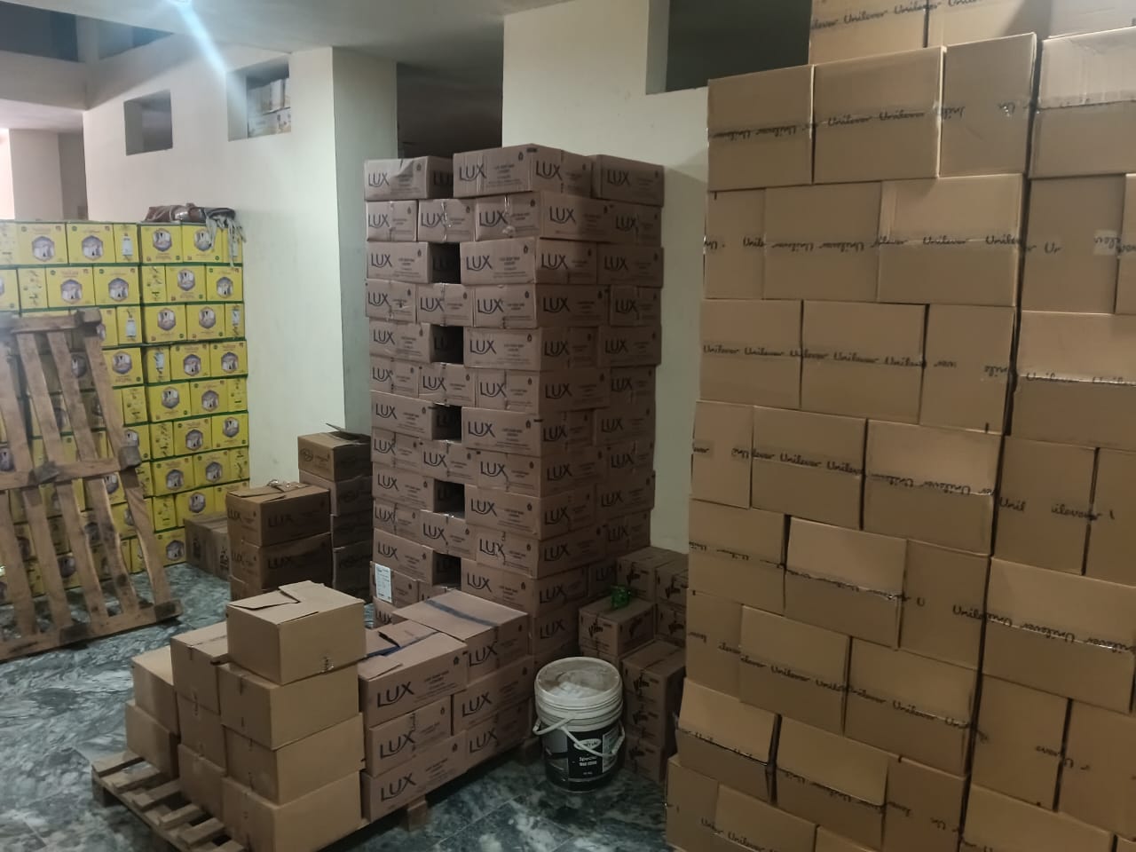 Sultan banaspati buckets and tins arranged in storage rows